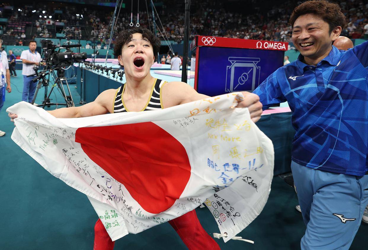 举重比赛上日本选手表现出色,夺得冠军 举重比赛上日本选手表现出色,夺得冠军